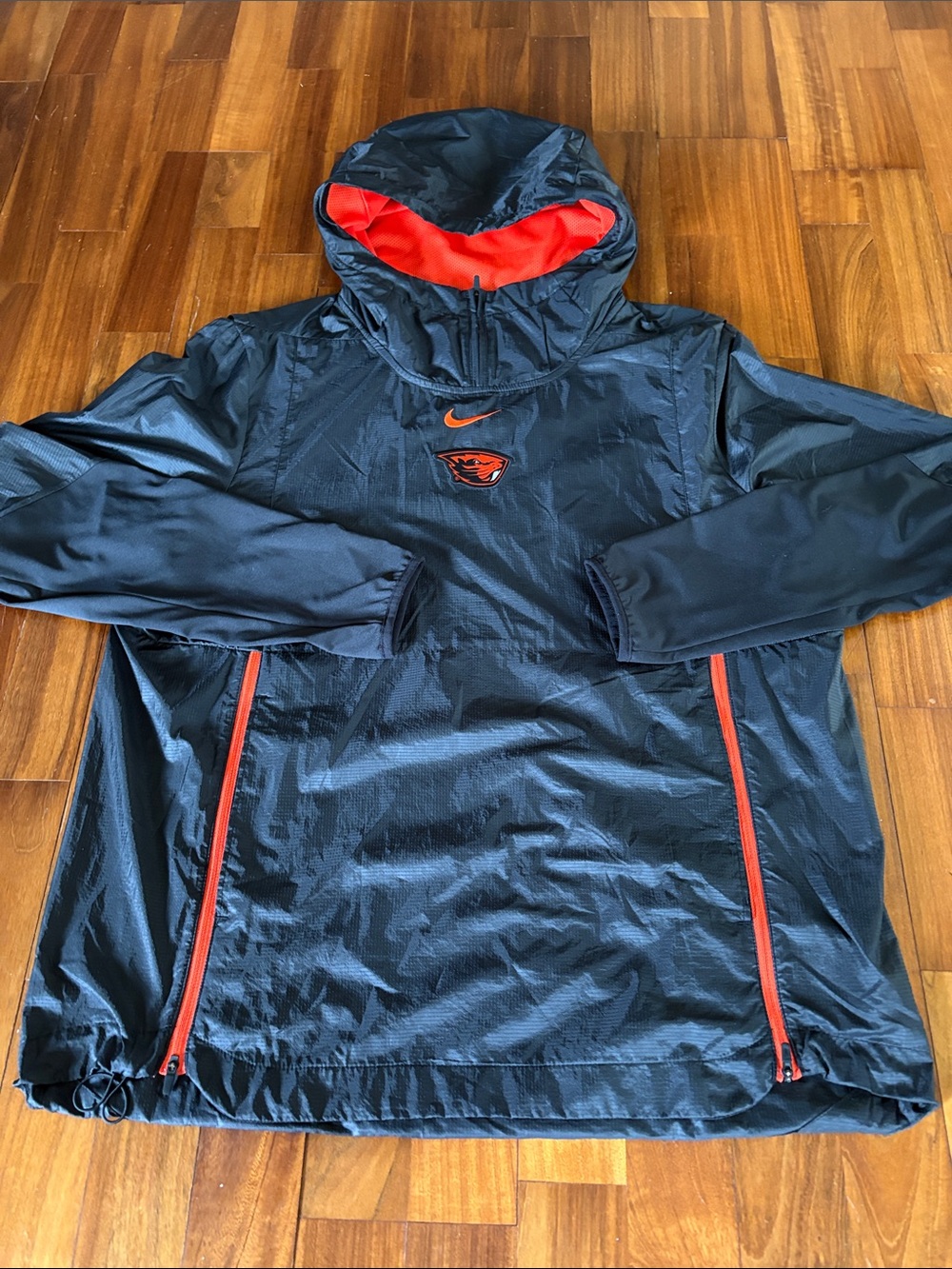 Nike Men's Black Hooded Windbreaker with Orange Accents